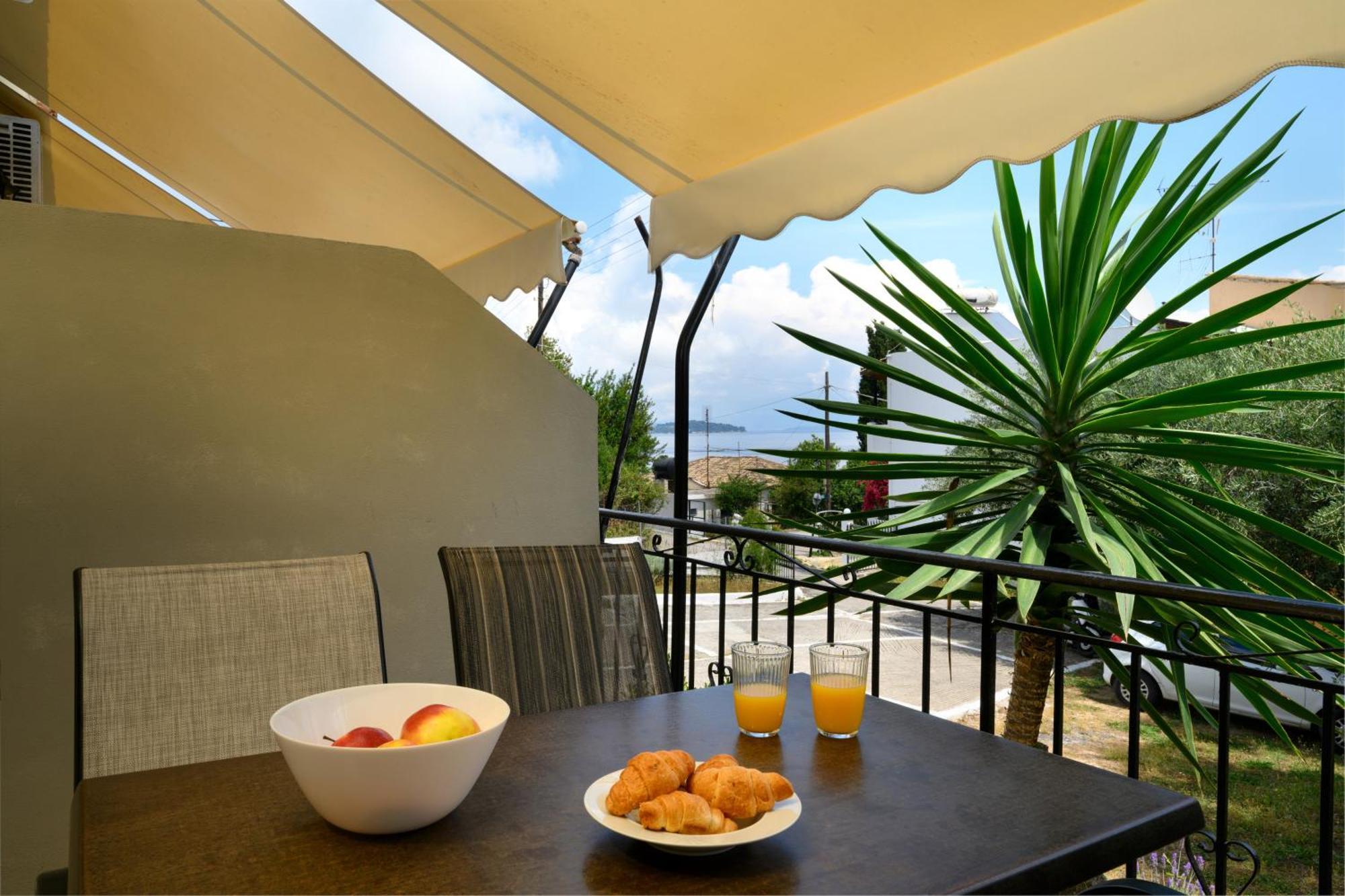 Olive Grove Poolside Apartments Benitses  Exterior photo